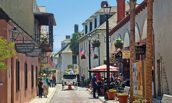 Horse carriage on cobblestone paved Aviles Street