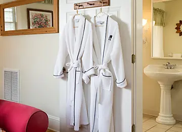monogrammed robes for guest use during their stay