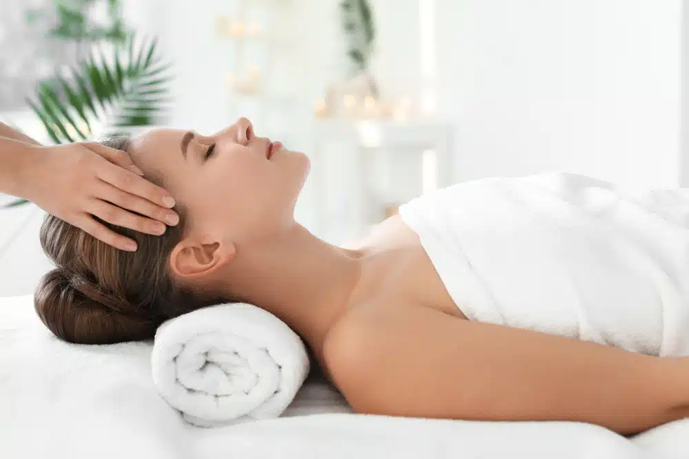 Get Pampered at the Salt Spa St. Augustine/More Great St. Augustine Spas to check out during your stay. Photo of a woman getting a massage