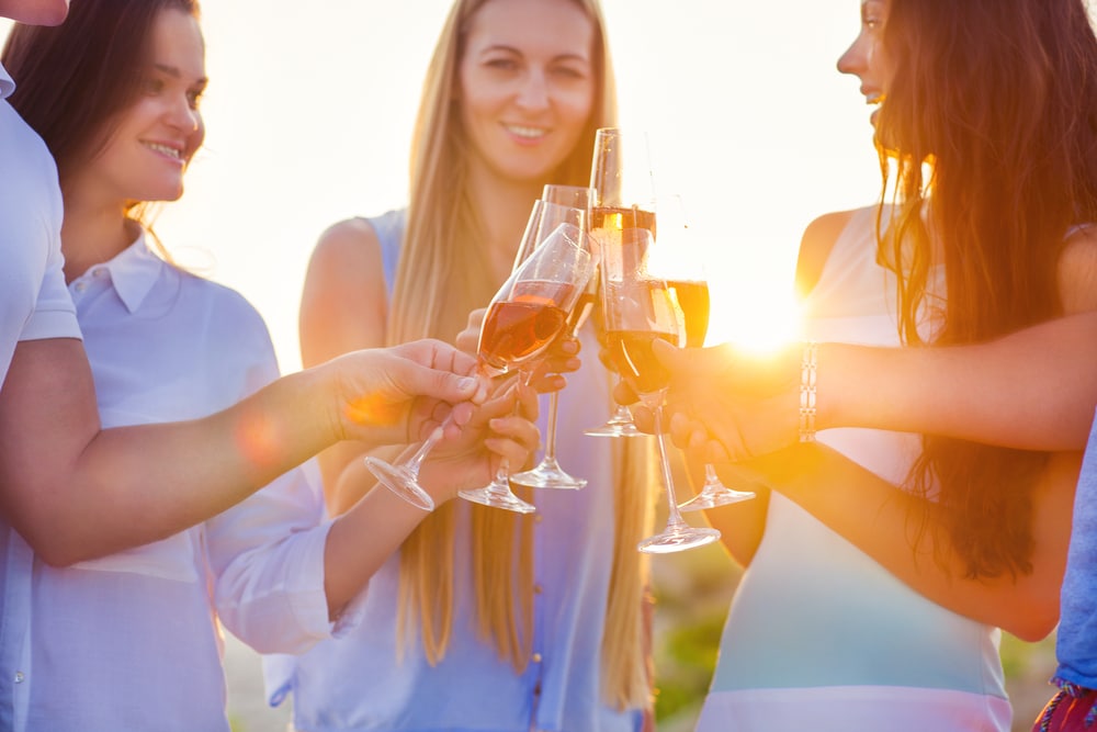 Friends enjoying a glass of wine at San Sebastian Winery in St. Augustine