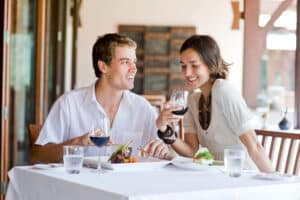 Young couple eating outside at one of the best places to eat in St. Augustine