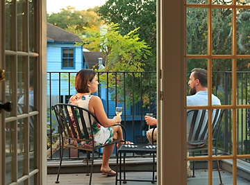 Couple on their private room balcony