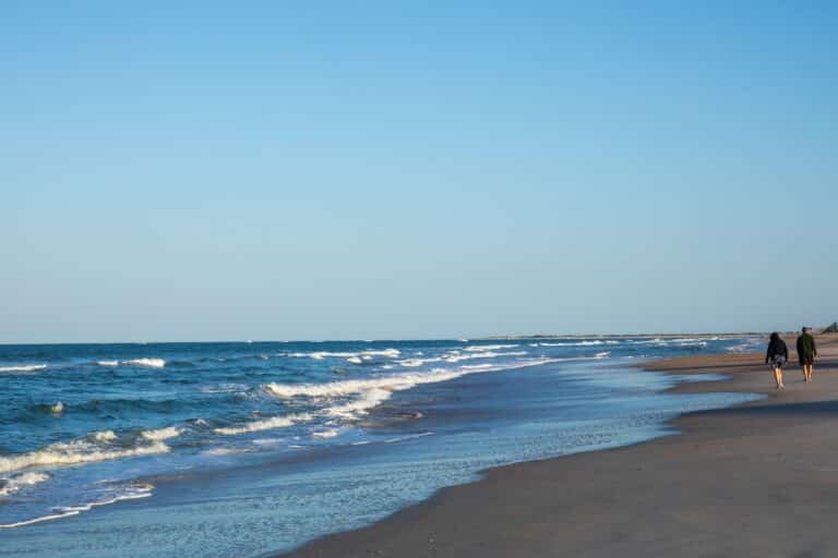 Enjoy a day at Vilano Beach, Florida when you visit St. Augustine. There is a wide beach with gentle waves washing ashore.